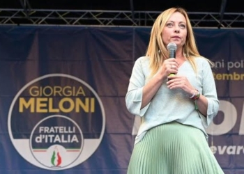 Leader of Italian far-right party Fratelli d'Italia (Brothers of Italy) Giorgia Meloni addresses supporters during a rally to launch her campaign for general elections, in Ancona, central Italy, on August 23, 2022. - Italians head to the polls for general elections on September 25, 2022. Opinion polls put Giorgia Meloni's post-fascist Brothers on course to lead the eurozone's third largest economy, in a coalition with the ex-premier's Forza Italia and the anti-immigration Lega. (Photo by Vincenzo PINTO / AFP) (Photo by VINCENZO PINTO/AFP via Getty Images)