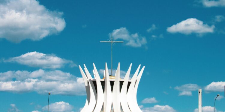 white concrete building under blue sky during daytime