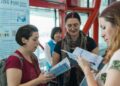 (240801) -- BEIJING, Aug. 1, 2024 (Xinhua) -- International visitors read manuals for Beijing Pass at Beijing Capital International Airport in Beijing, capital of China, July 31, 2024. TO GO WITH "Beijing issues prepaid cards for international visitors" (Xinhua)