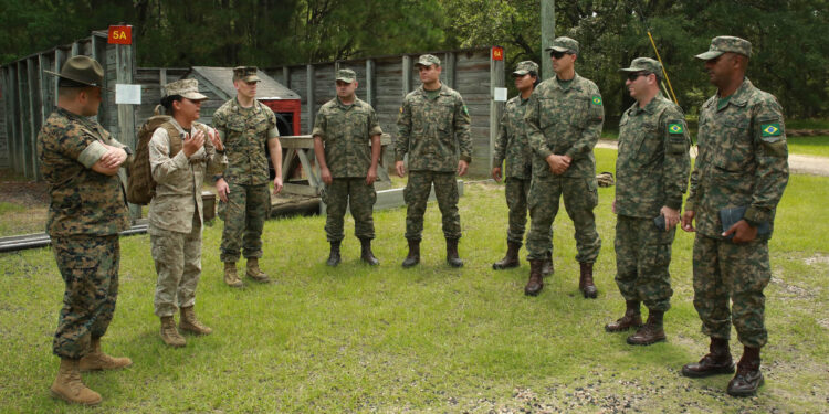 Marines with the Brazilian Marine Corps conduct a tour of Marine Corps Recruit Depot Parris Island S.C., June 8, 2023. The focus of the Brazilian Marines touring Parris Island is to educate the group on the processes of training to bring back to their own branch of service. (U.S. Marine Corps photo by Lance Cpl. Sarah Grawcock)