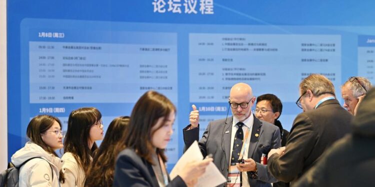 (250109) -- TIANJIN, Jan. 9, 2025 (Xinhua) -- A participant tests his interpretation device during the 20th China Expo Forum for International Cooperation in Tianjin, north China, Jan. 9, 2025. With the theme of "Empowering a sustainable future with new quality productive forces," the 20th China Expo Forum for International Cooperation kicked off here on Thursday, attracting over 600 attendees from 20 countries and regions. (Xinhua/Li Ran)