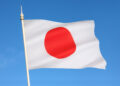 The national flag of Japan is a white rectangular flag with a large red disk (representing the sun) in the center. This flag is officially called Nisshoki in Japanese, but is more commonly known as Hinomaru (circle of the sun).